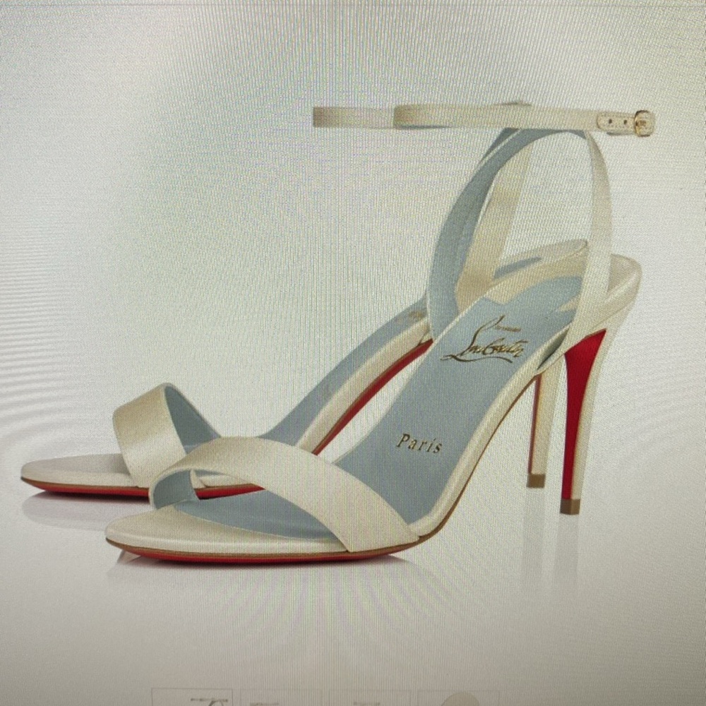 Gently worn off white strapy sandals